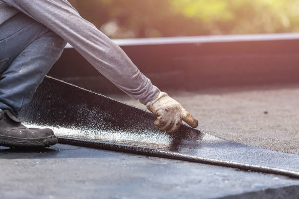 Professional Exterior Waterproofing technician working in Millington, MI